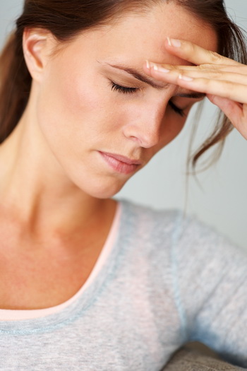 woman suffering from headache